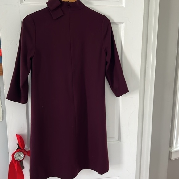 GOAT AVA BOW EMBELLISHED WOOL CREPE TURTLE NECK MINI DRESS - Picture 9 of 9